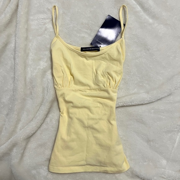 Brandy Melville Tops - brandy melville butter yellow victoria tank top